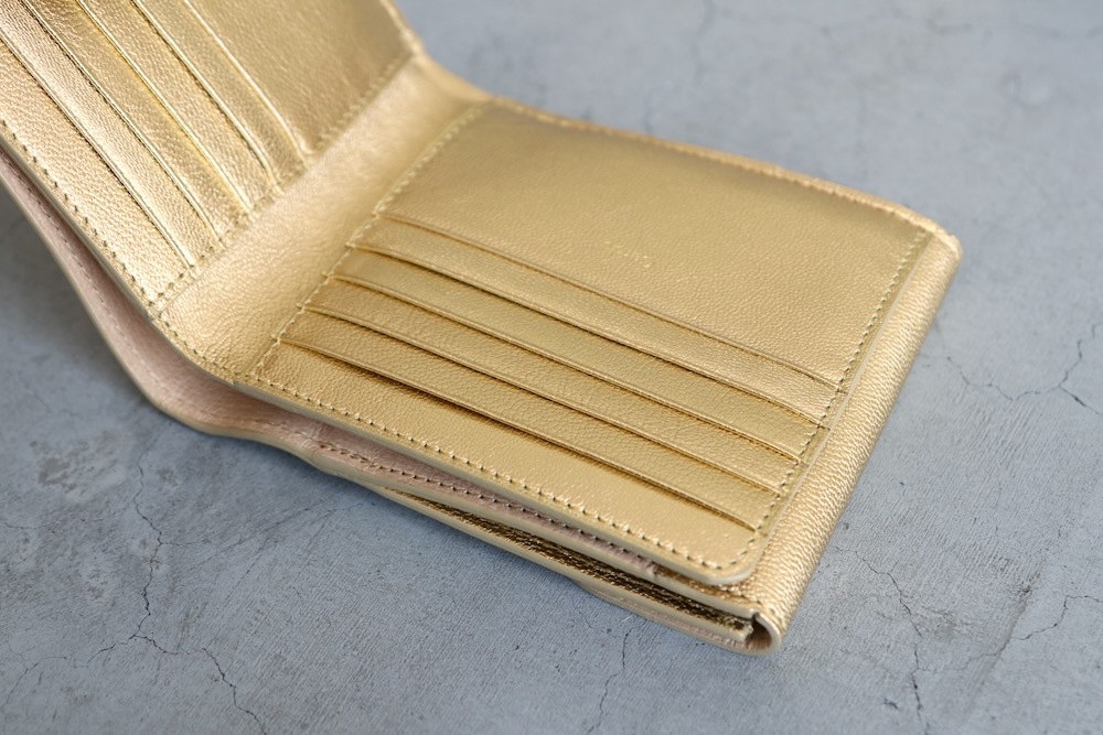 i ro se () "FOLD 2F WALLET"