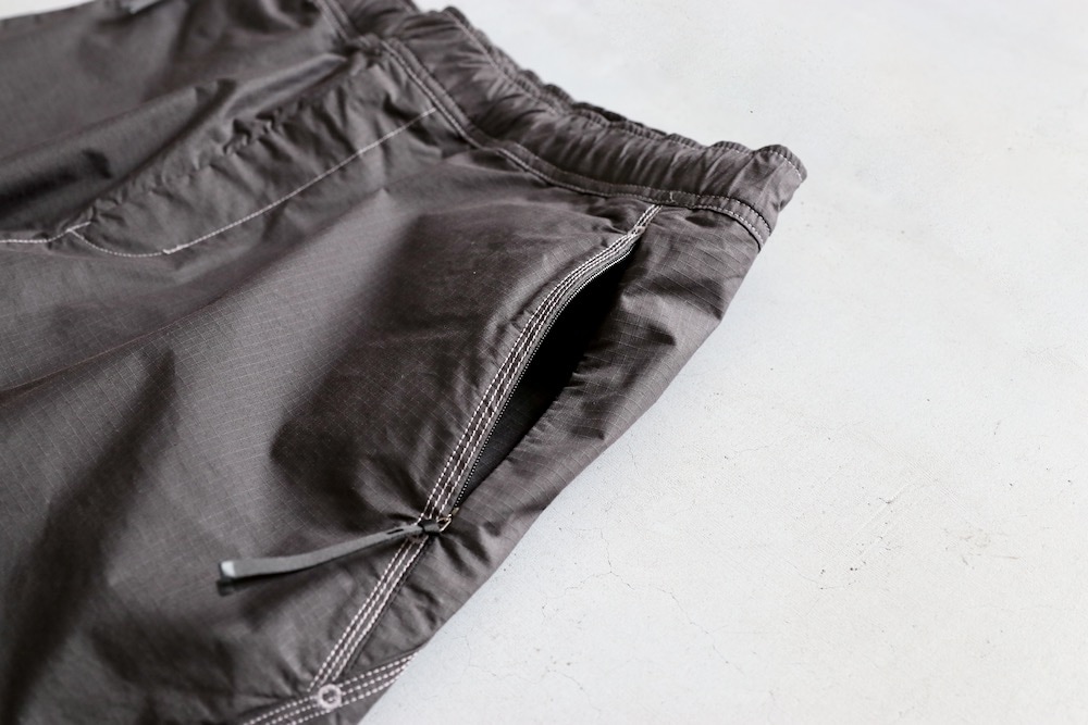 GOLDWIN 0 (������ɥ����� ����) "Parachute Seed Rip-siop Pants"