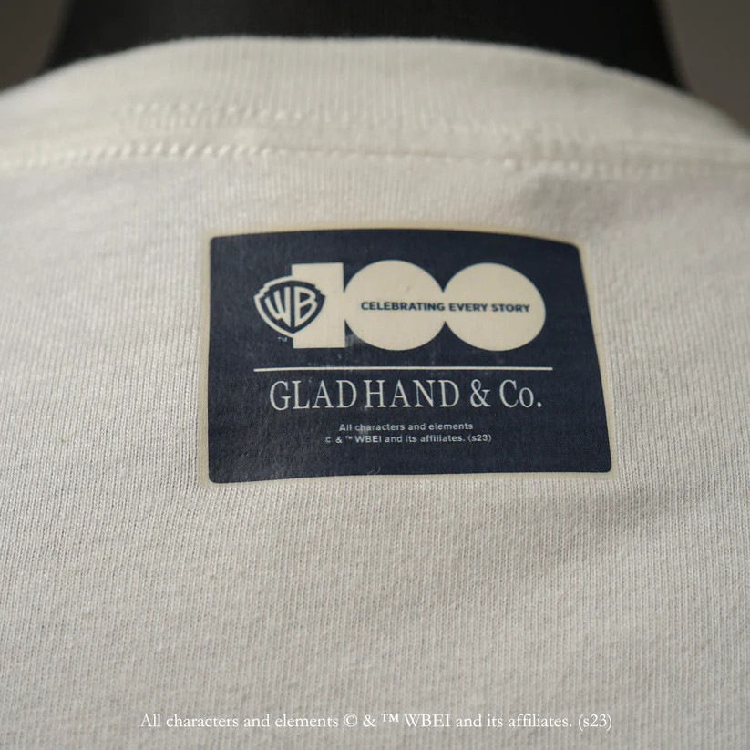 WARNER BROS. 100TH - S/S T-SHIRTS��GLAD HAND ��T����ġ�