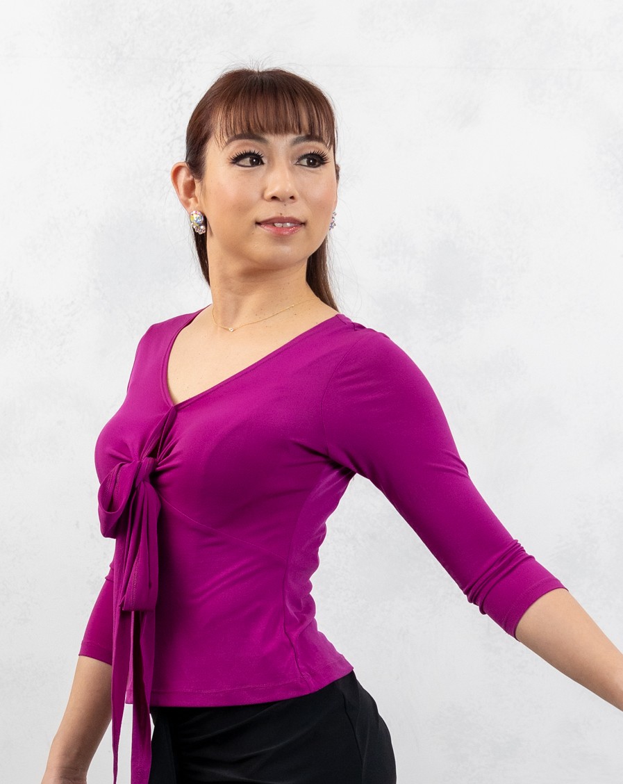 Vネックトップス