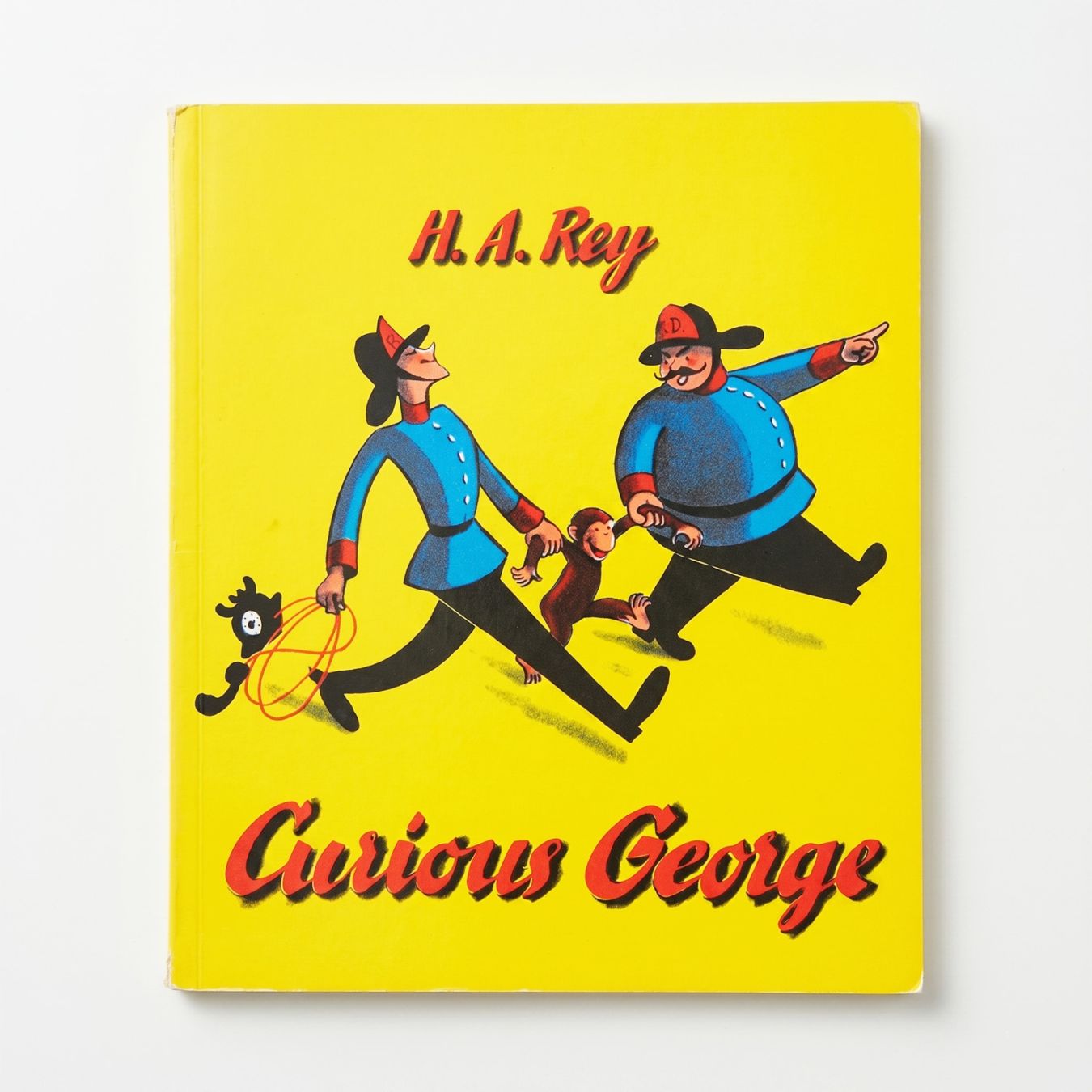 Curious George ～ひとまねこざるときいろいぼうし～　ペーパーバック版