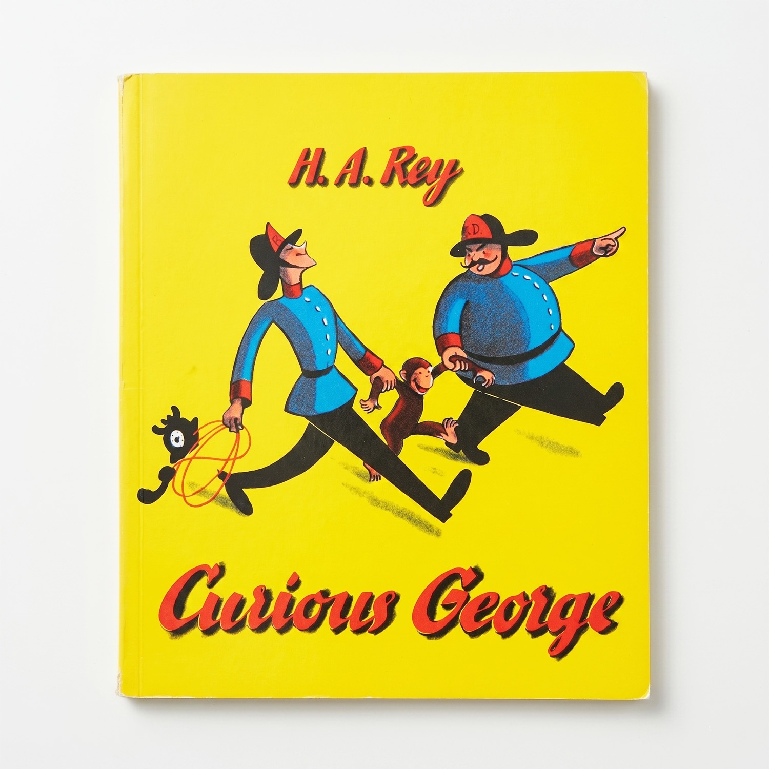 Curious George ～ひとまねこざるときいろいぼうし～ ペーパーバック版