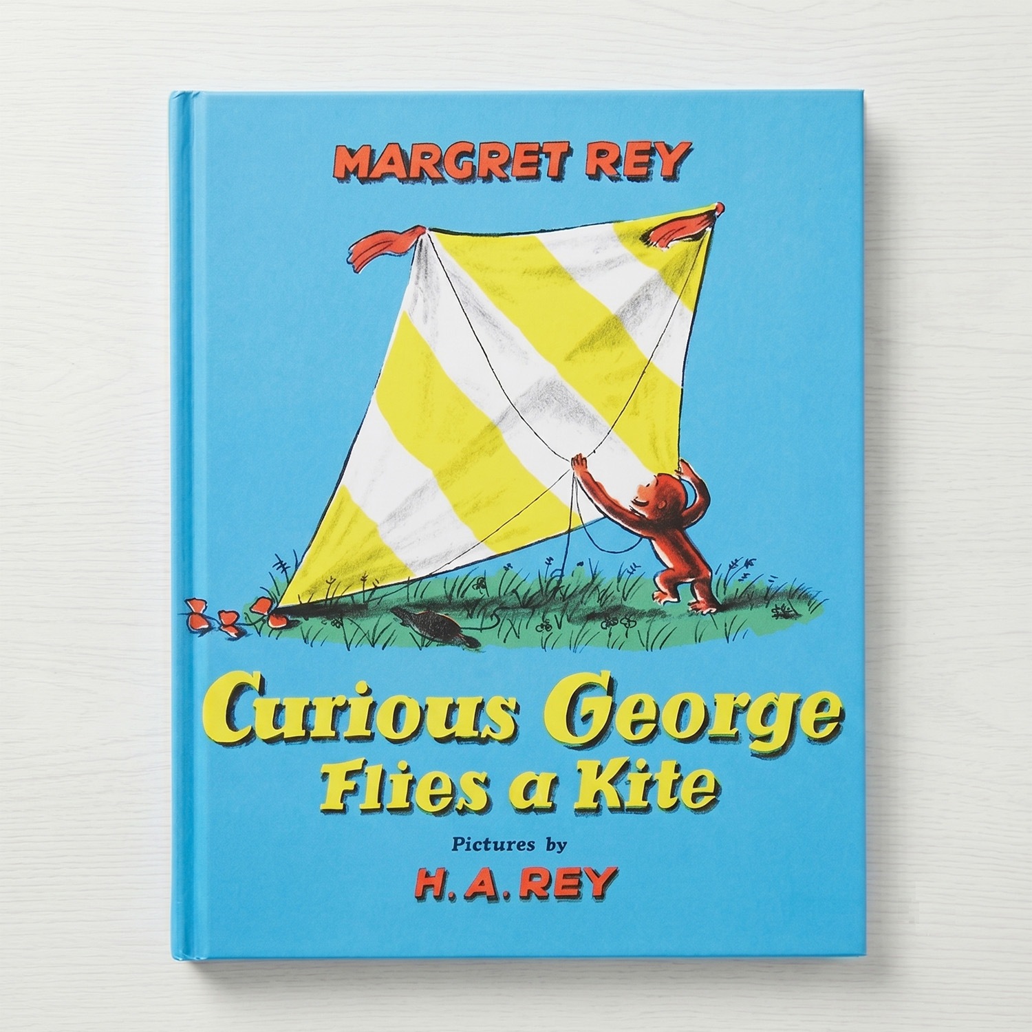 Curious George Flies a Kite　～たこをあげるひとまねこざる～