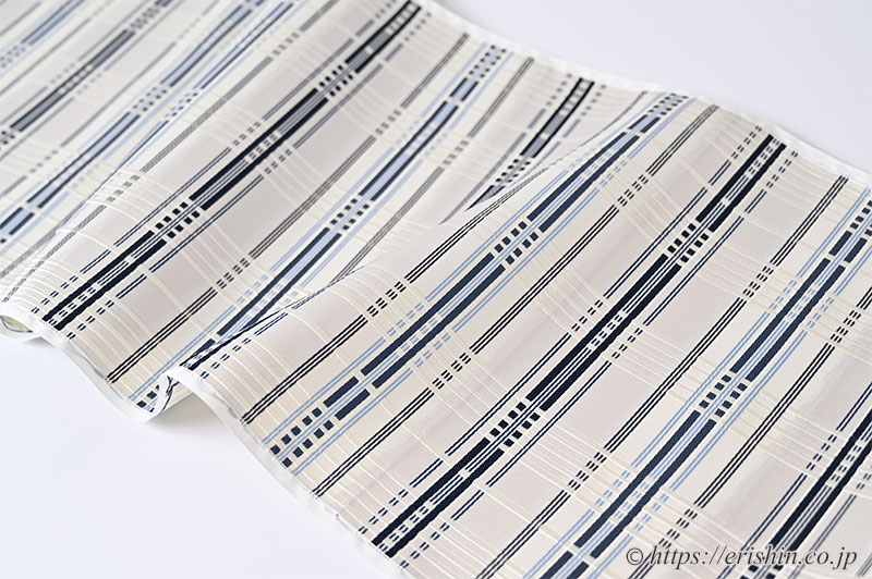 美術工芸 啓 九寸織名古屋帯(錦熨斗目/深縹色を中心に水色を添えて) ※お値段は、お問い合わせ下さい。