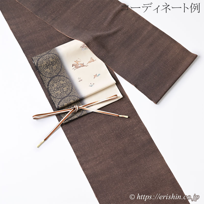 染名古屋帯(正倉院狩猟文/紬地)『着物・呉服えり新』 染名古屋帯(正倉院狩猟文/紬地)『着物・呉服えり新』