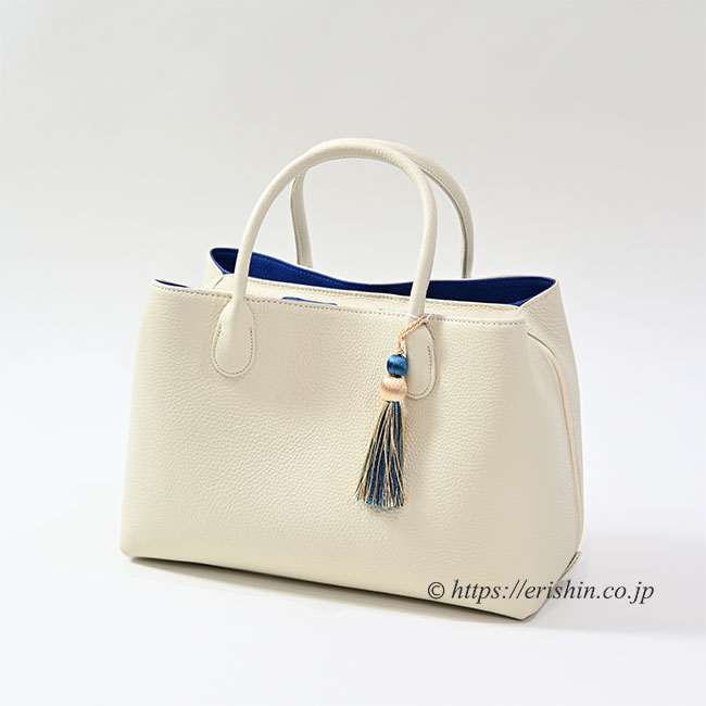 牛革シュリンクバッグ（アイボリー×ネイビーブルー/タッセル付き
