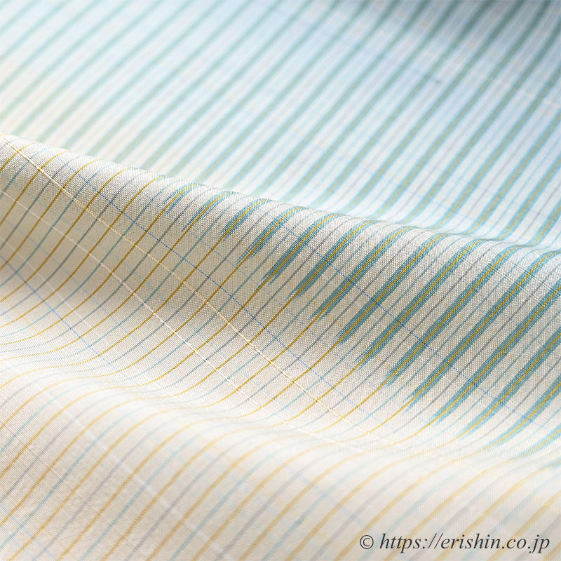 芝崎圭一 座繰紬(絣・多色暈し段/鳥の子色に薄花色のさざ波段)