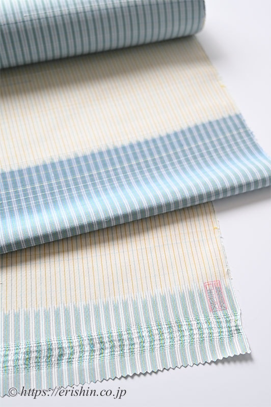 芝崎圭一 座繰紬(絣・多色暈し段/鳥の子色に薄花色のさざ波段)