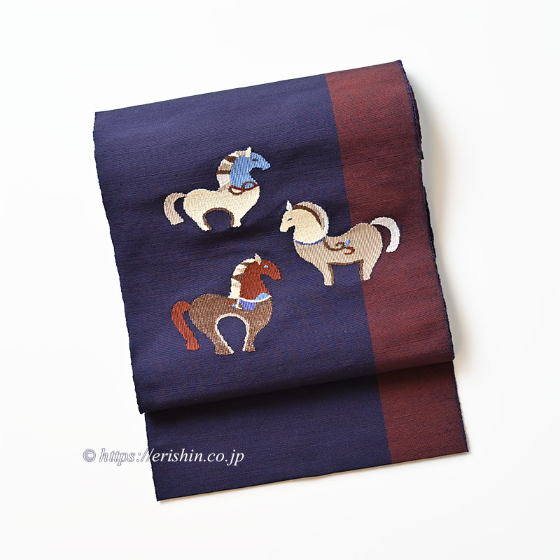 洛風林 八寸織名古帯(馬のつどい/茄子紺色×鳶色の縞)「着物と帯・呉服えり新」
