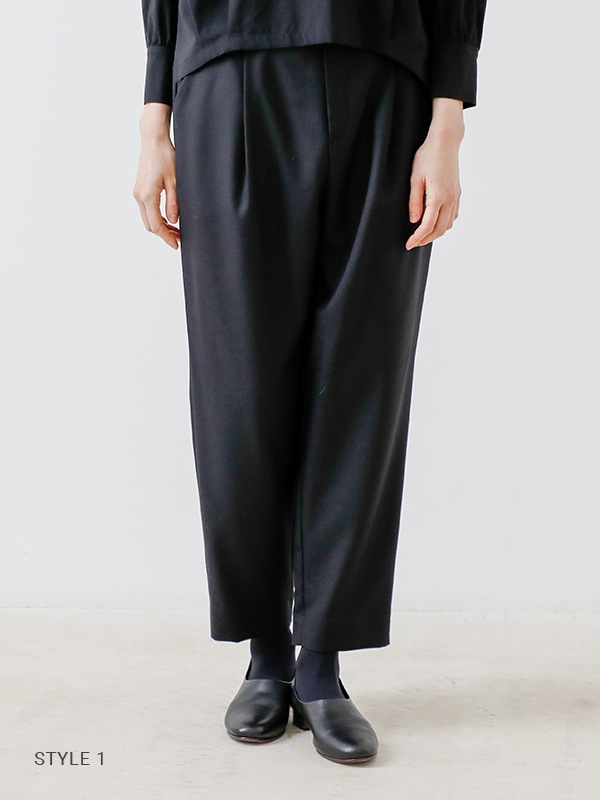 black tuck pants