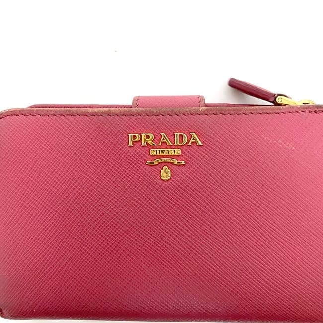 プラダ 二つ折り 財布 ec-22190 ピンク 1ML225 美品 サフィアーノ