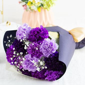 青いカーネーションムーンダスト12本花束