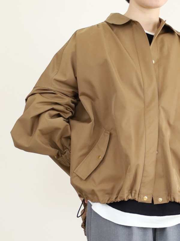 【trois】裾ドロストドルマンスリーブブルゾン