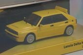  T64R-TL049-GG Tarmac Works 1/64  Lancia Delta HF integrale Giallo Ginestra 