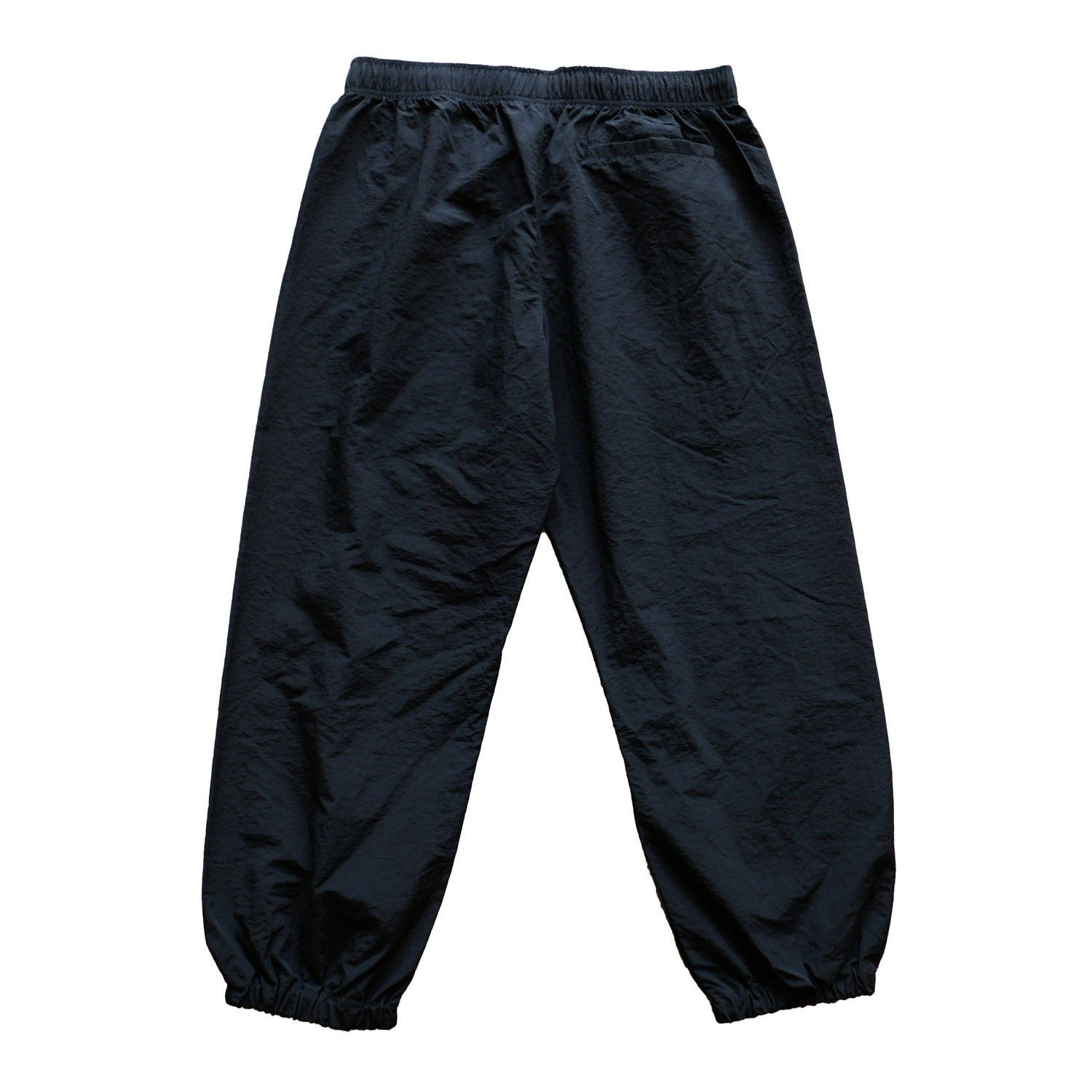 FLSPC. : NYLON PANTS 