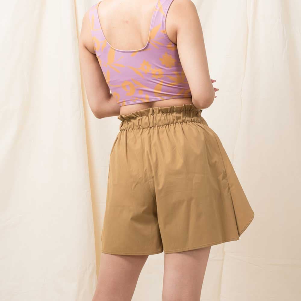 Lilas Campbell rash over pants produced by AMUSA
