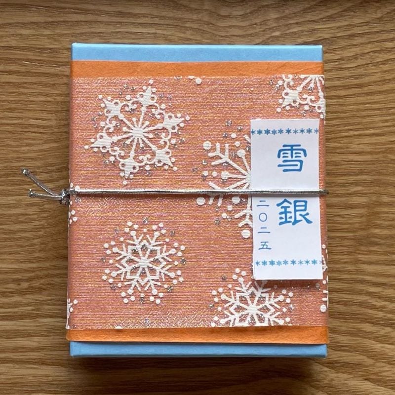 雪銀-2025」 オレンジ 風味豊かで口ほどけの良い和三盆糖の雪だるまを