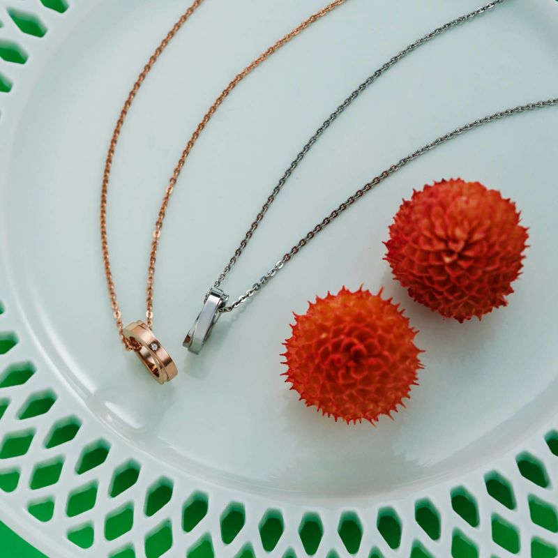 ≪white clover/ホワイトクローバー≫ペアネックレス ステンレス クロス