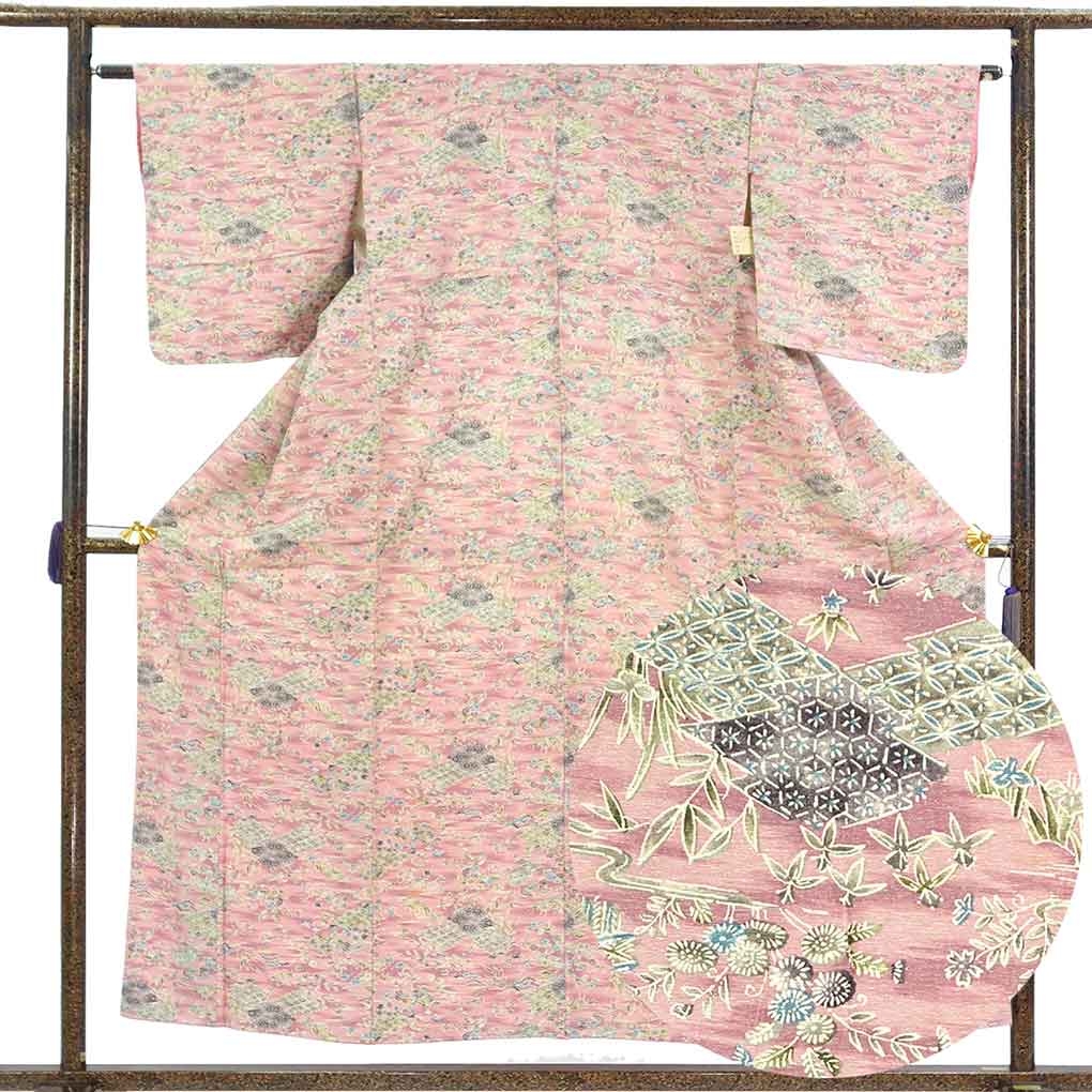 紬 リサイクル着物 身丈155cm 裄63cm 前幅23.5cm 後幅29cm 袖丈49cm 袖幅32cm レディース 袷 四季の花柄 裄Mサイズ 秋冬春用 正絹（シルク）ピンク 未使用品 リメイク リユース【ランクS】
