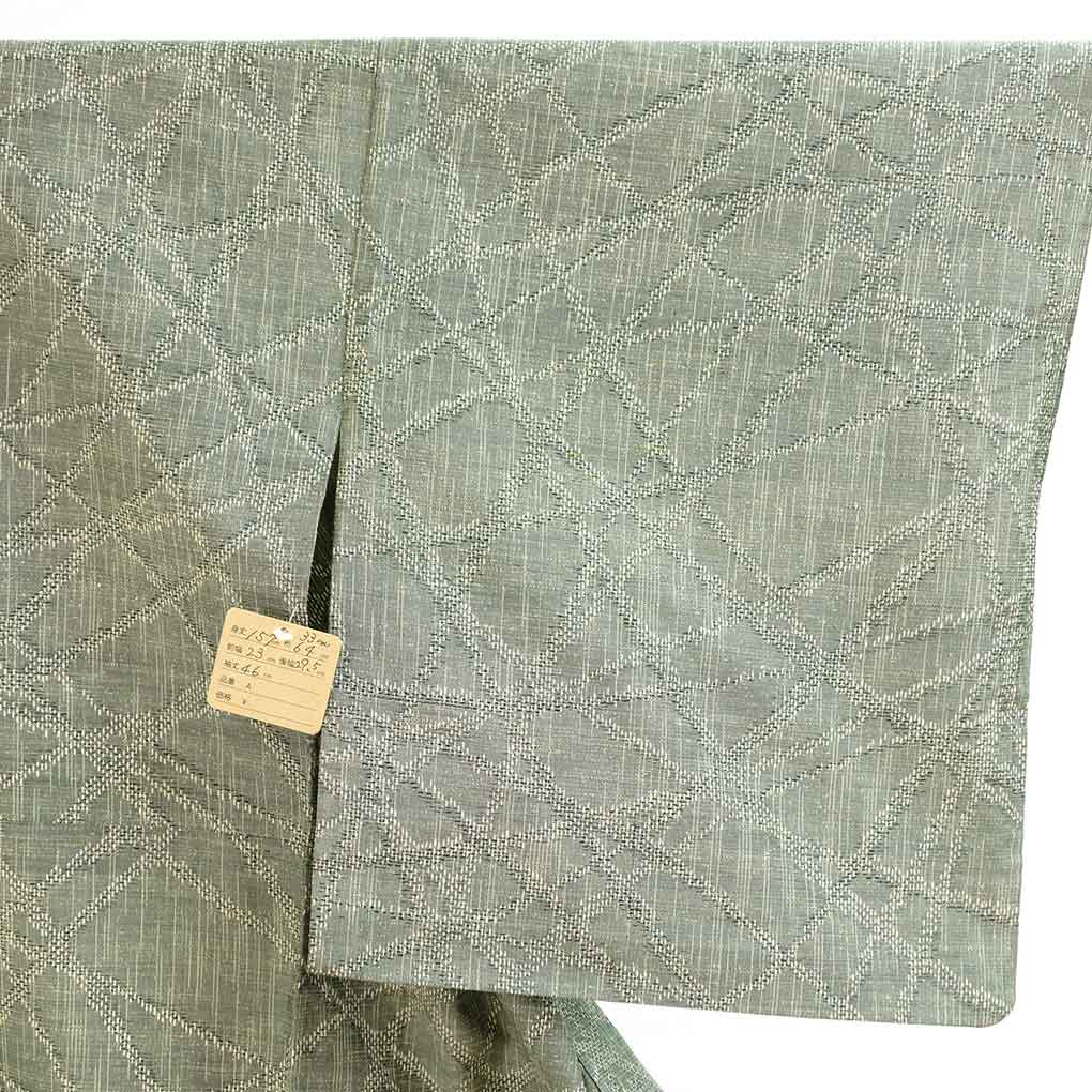 紬 リサイクル着物 身丈157cm 裄64cm 前幅23cm 後幅29.5cm 袖丈46cm 袖幅33cm レディース 単衣 連続模様 裄Mサイズ 初夏・初秋用 正絹（シルク）グリーン やや難 リメイク リユース【ランクB】