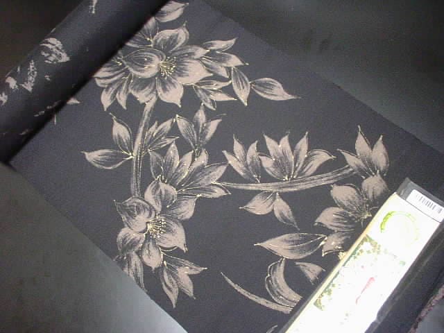 宮之原織物謹製鹿児島県産旗印証紙付き大島紬全通柄黒地名古屋帯【新品】