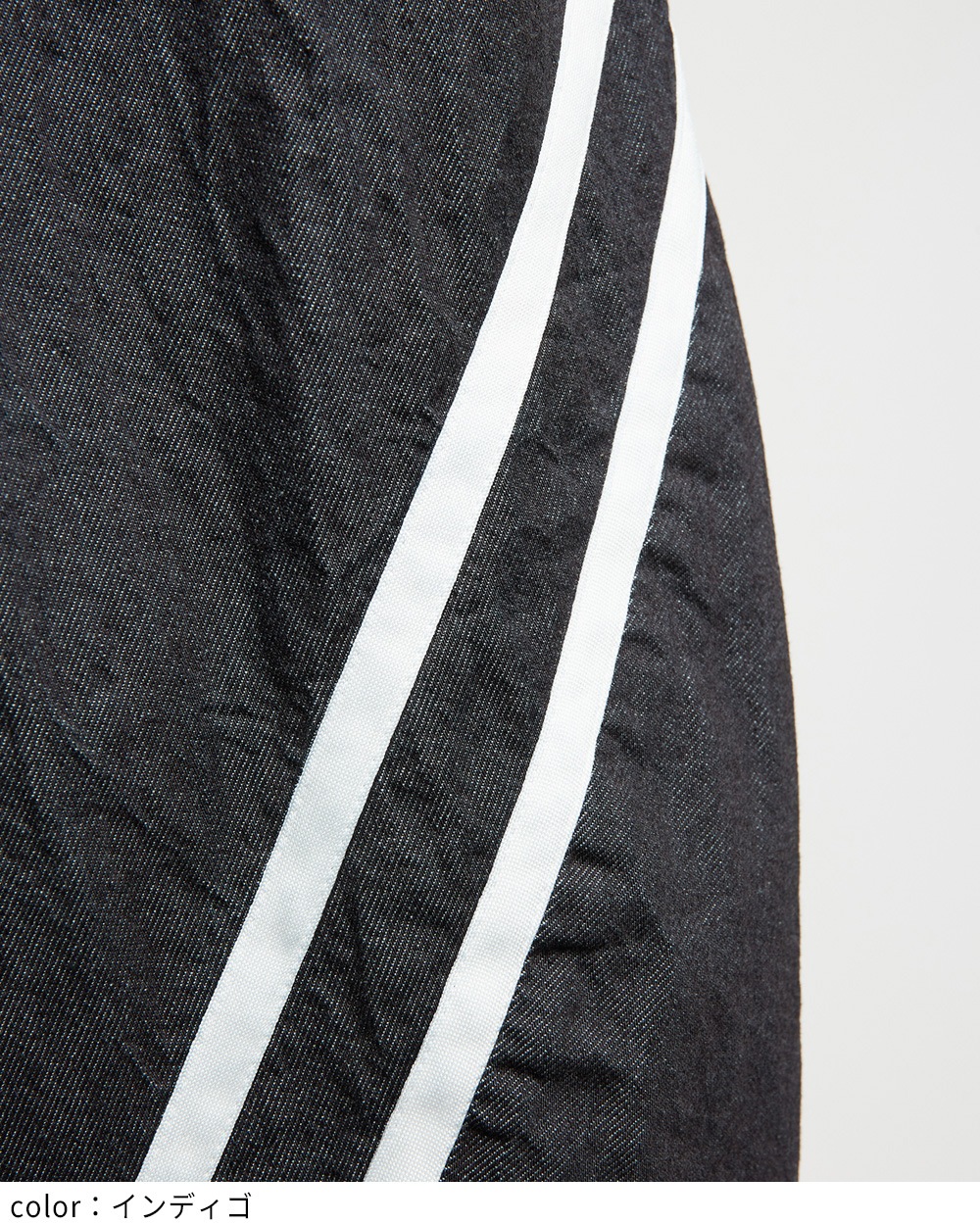 ダイアゴナルデニムパンツ