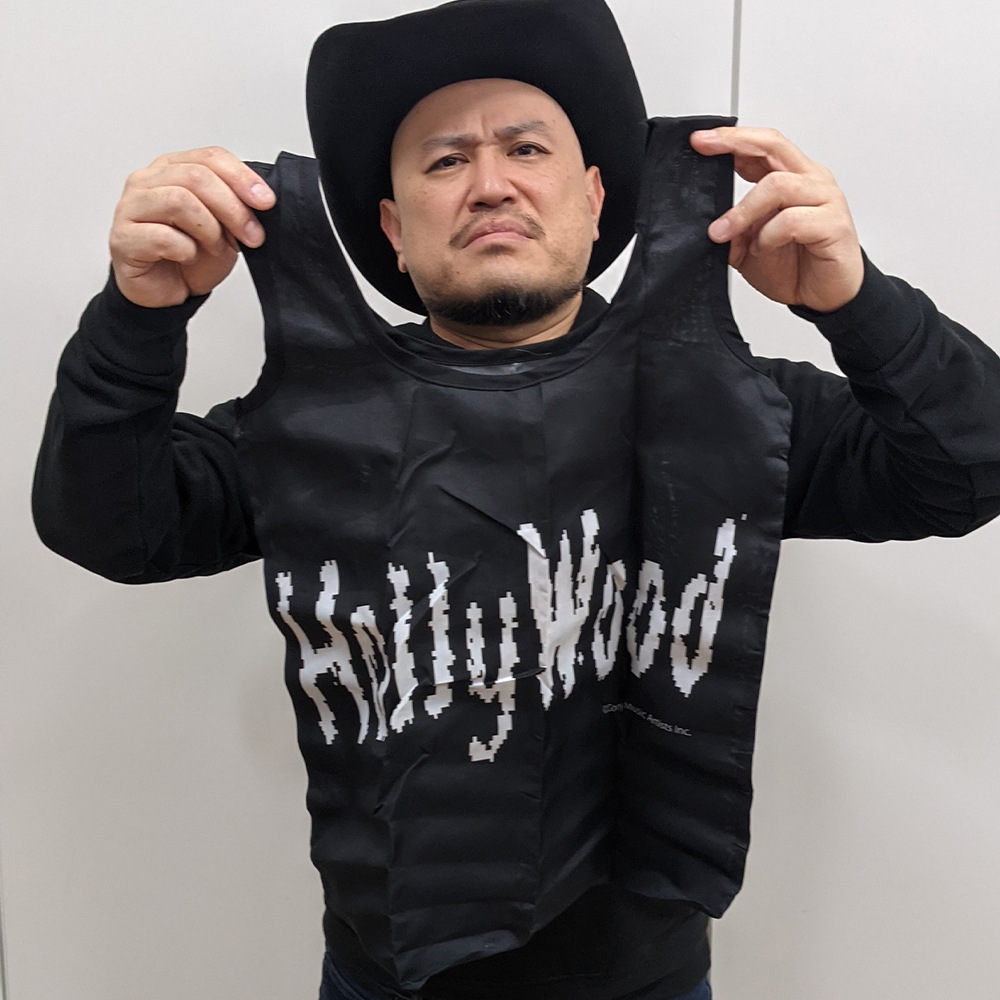 ハリウッド・ザコシショウ ハリウッドザコシショウ/エコバッグ/Hollywoodロゴ 総柄/ブラック