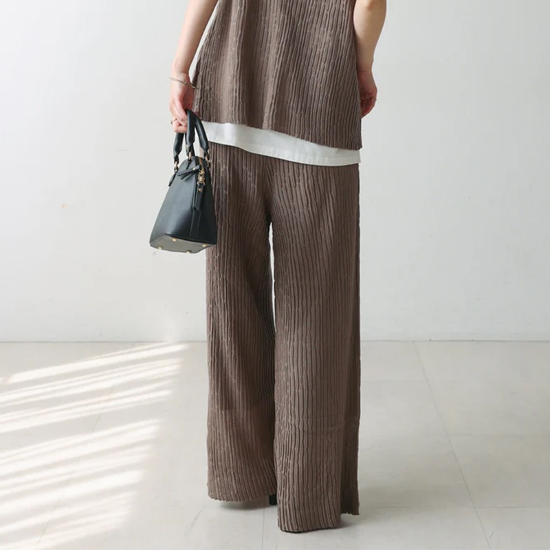 PERVERZE（パーバーズ）の「Wave Border Loose Knit Pants
