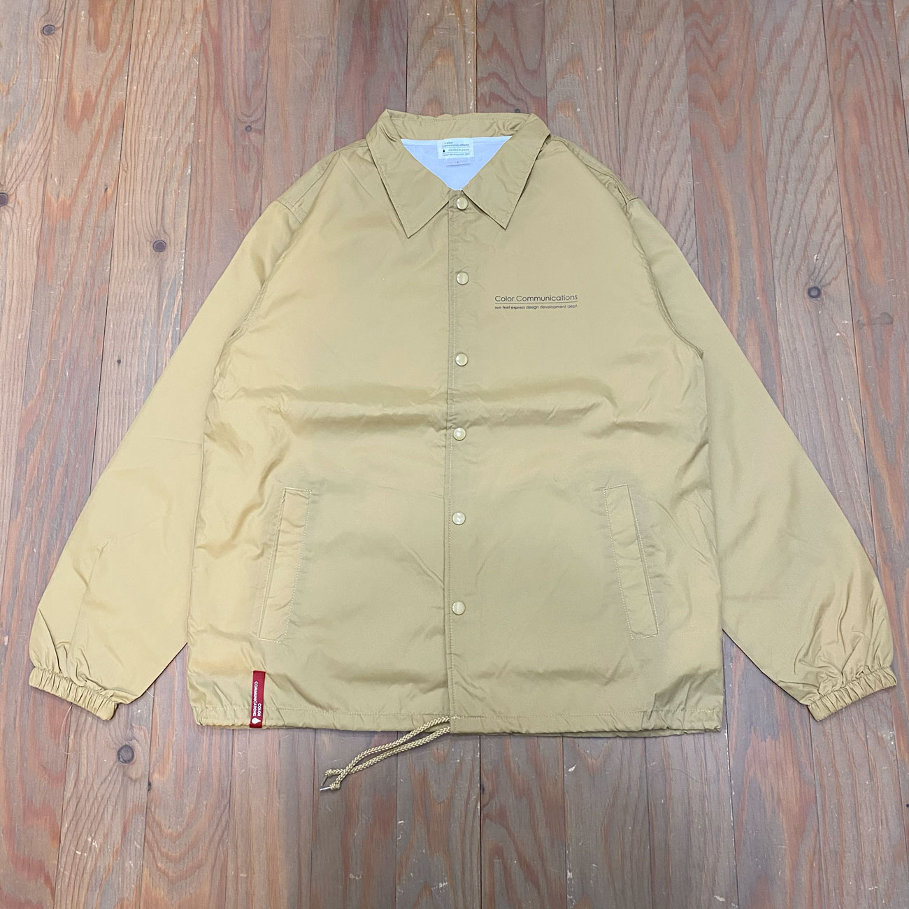 COLOR COMMUNICATIONS RE-LETTER 2012 COACH JACKET