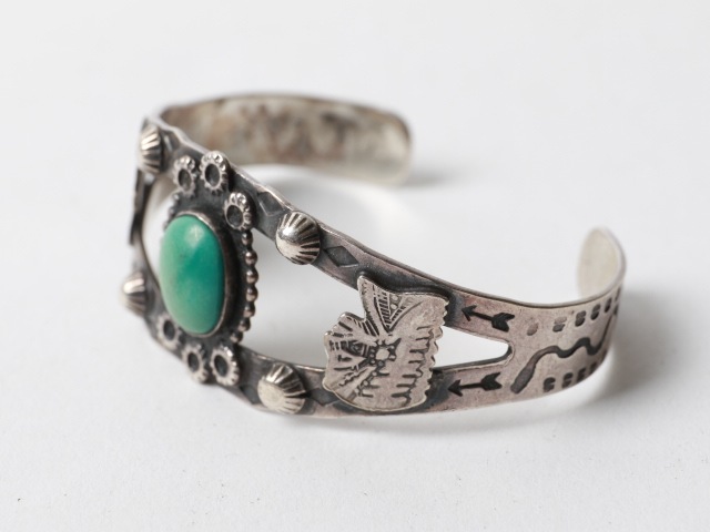 Vintage Navajo Silver Bangle Turquoise & Indian Heads