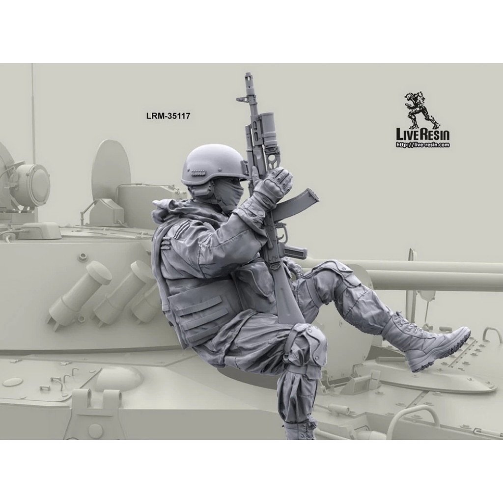 LRM-35117 Modern Russian soldier with AK-74 with GP launcher, riding on armor vehicle