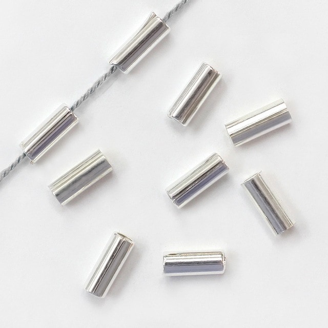 国連ピースメダル　品位SV925　25㌘　スターリングシルバー　ミント出し 0015795MMSVB SV925製ビーズ 5.0×3.0×3.0mm穴径2.3mm 10ヶ - 卸