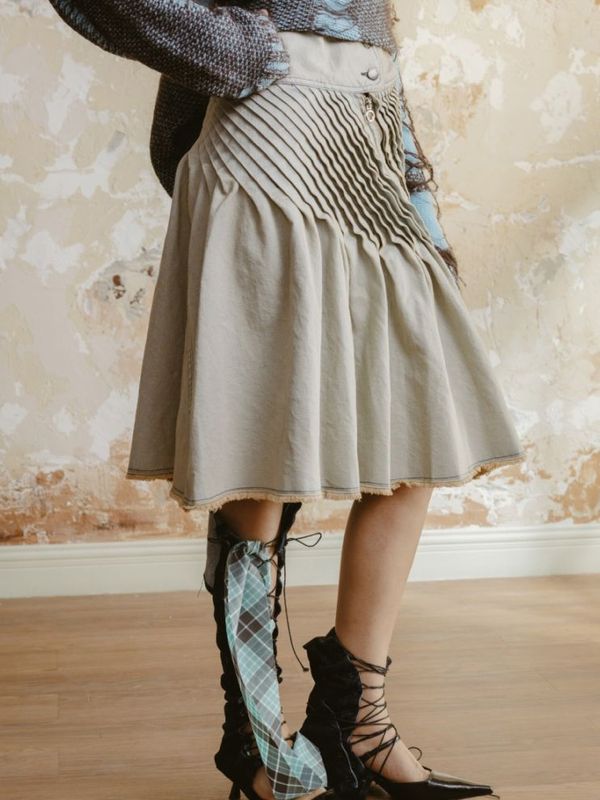 《PONDER.ER》CONTORT PLEATED DENIM スカート
