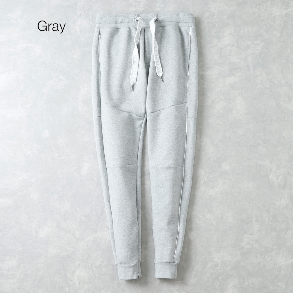 1PIU1UGUALE3 RELAX(ウノピゥウノウグァーレトレ リラックス)パイピングロゴ ワイドスピンドルジョガーパンツ