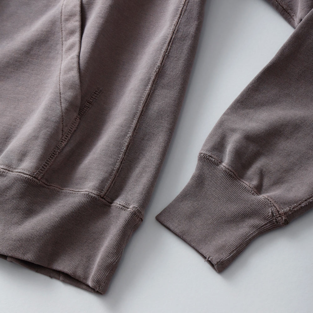 REMI RELIEF（レミレリーフ） SP加工裏毛パーカー