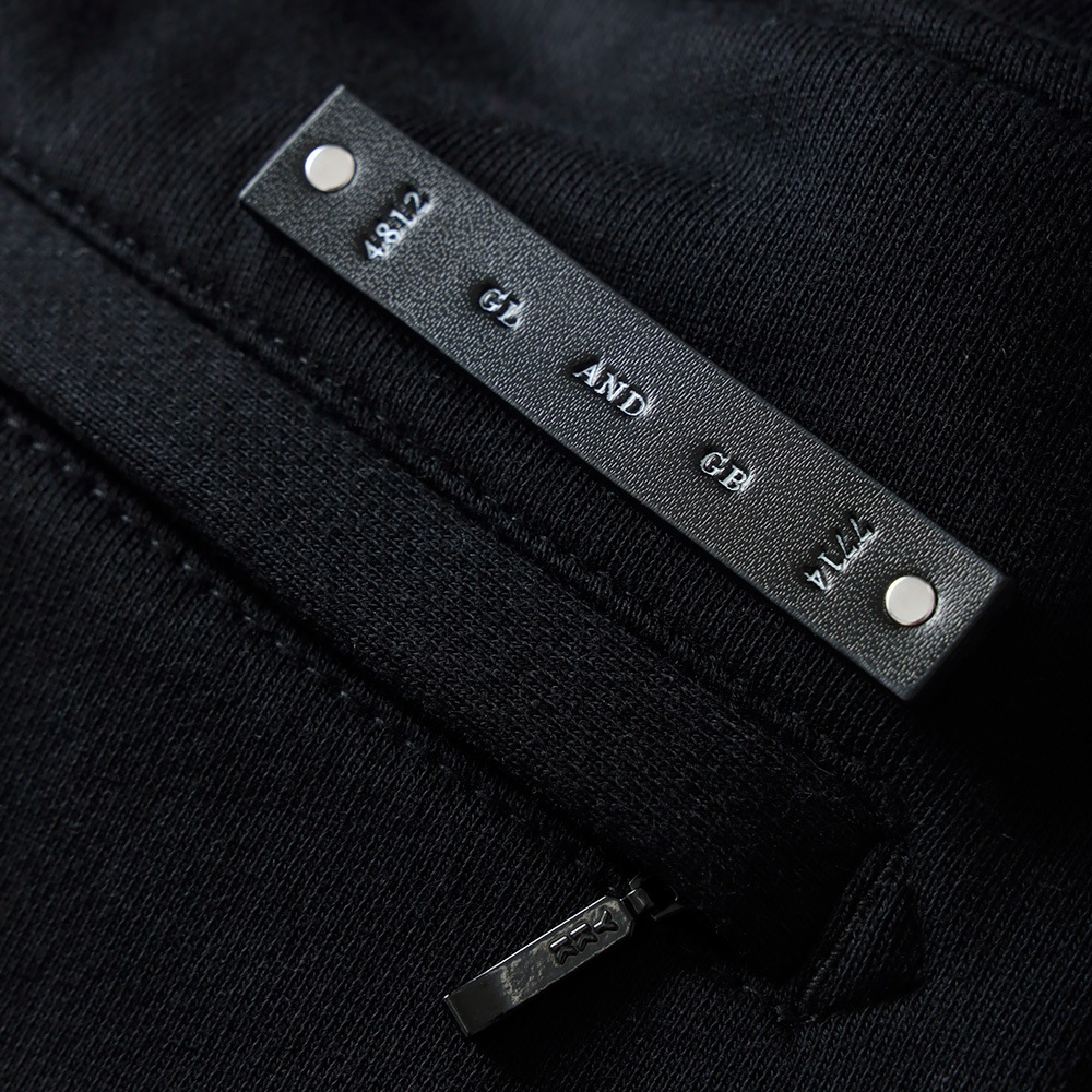 THE CRIMIE(クライミー)レザーパッチ スウェットパンツ