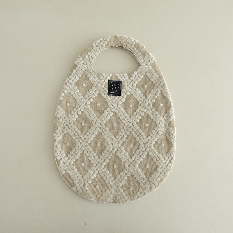 底が丸いトートバッグ　ミナペルホネン　mina perhonen ミナ トートバッグ タンバリン ブラック｜ミナ ペルホネン