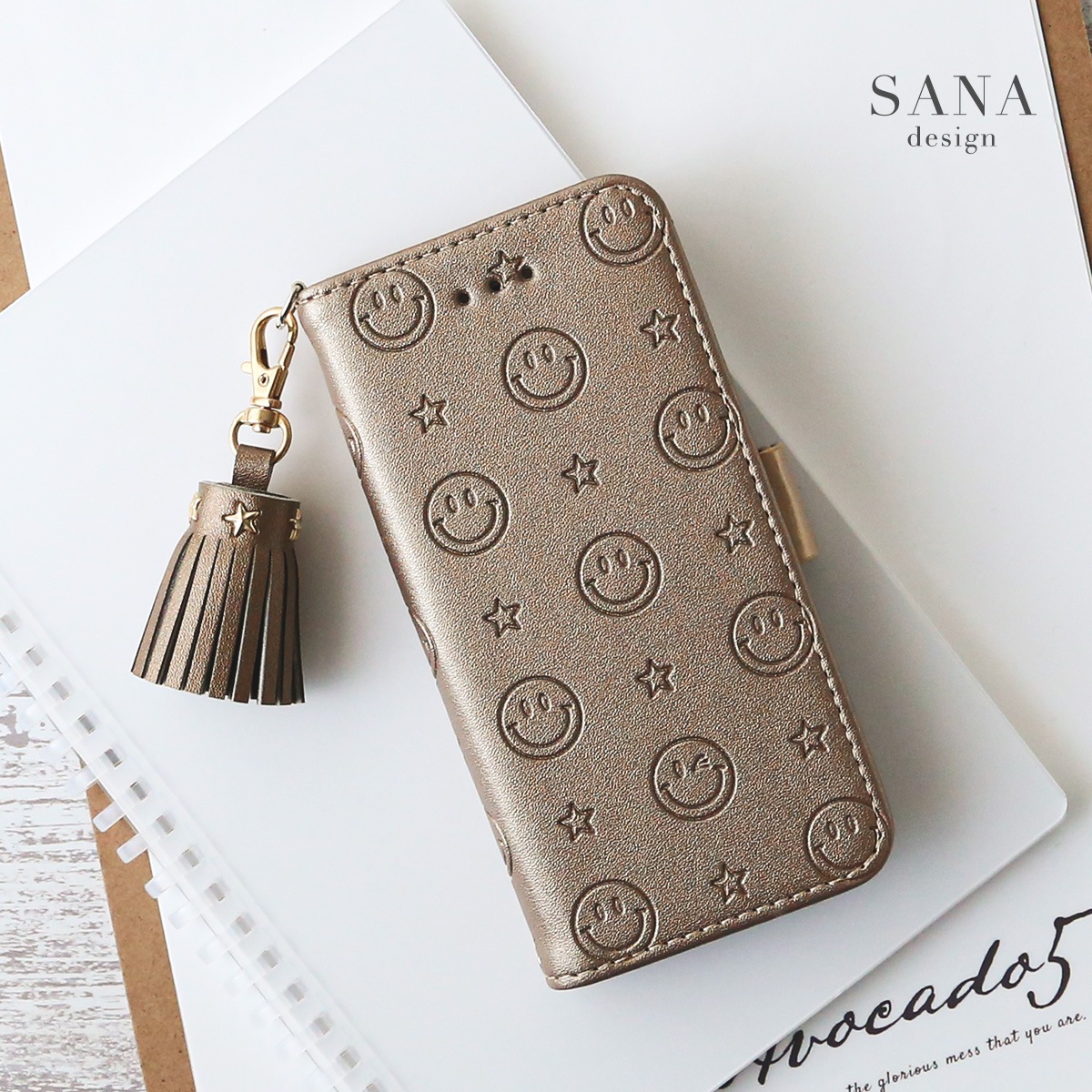 ブロンズ エンボス にこちゃん スタッズ タッセル付き 」OPPO