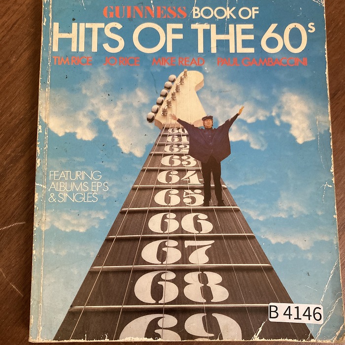 B4146　「GUINNESS BOOK OF HITS OF THE 60s TIM RICE JO RICE MIKE READ PAUL GAMBACCINI」英国音楽書籍