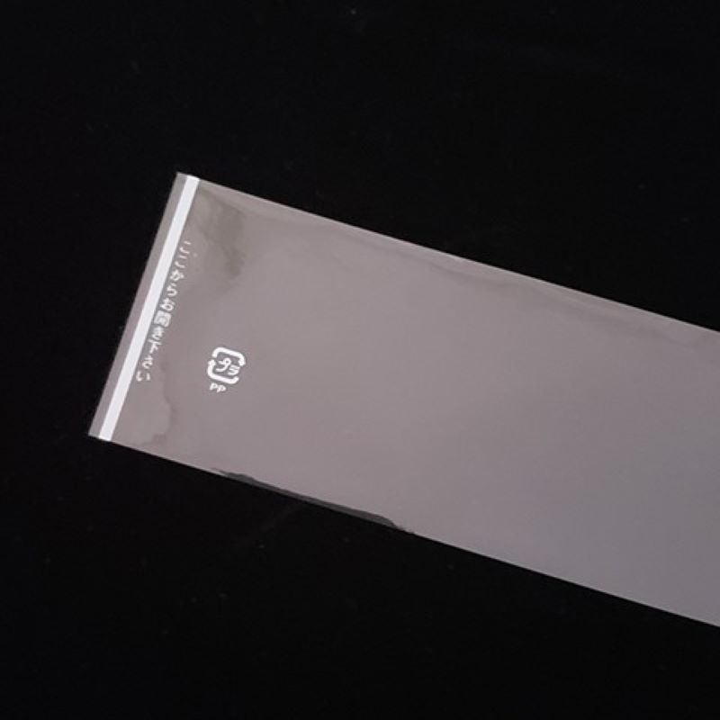 ケーキフィルム　白線入り　60×300ミリ　1,000枚×5束　業務用　ここから ケーキフィルム ここから40×300（CF-9） （1,000枚入） | フィルム