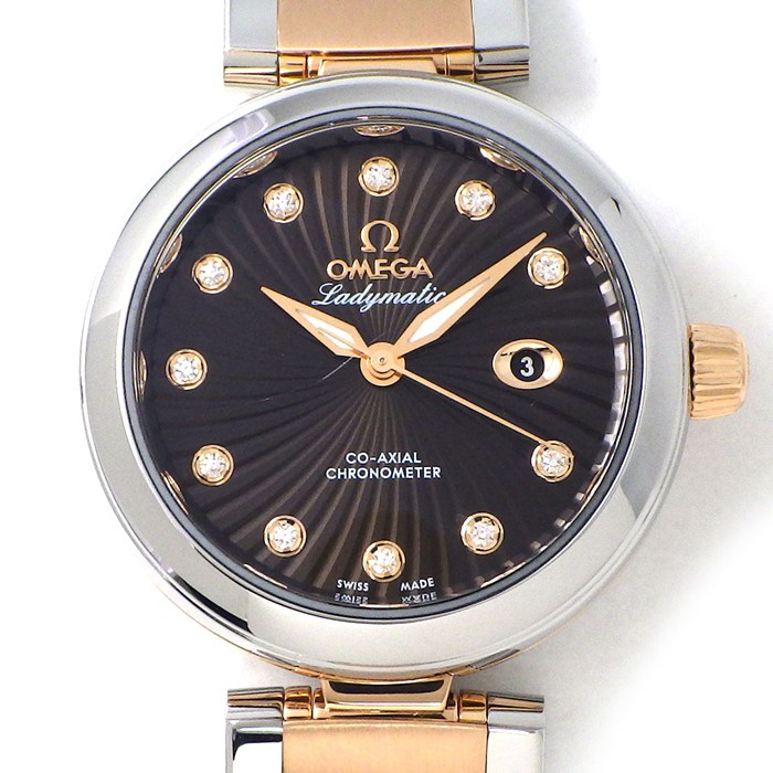 オメガ OMEGA 腕時計 デ・ヴィル レディマティック 425.20.34.20.63.001 ブラウン文字盤 11ポイント ダイヤインデックス デイト 裏スケ K18PG SS 自動巻き 【箱・保付き】 【中古】