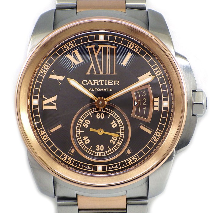 カルティエ Cartier 腕時計 カリブル W7100050 ブラウン文字盤 ローマンインデックス デイト 夜光針/インデックス スモールセコンド 裏スケ K18PG SS 自動巻き 【中古】