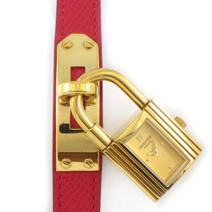エルメス HERMES 腕時計 ケリーウォッチ KE1.201 カデナ ロックモチーフ レクタンギュラー シャンパンゴールド文字盤 レッド リザードレザーベルト GP クオーツアナログ 【箱・保付き】 【中古】