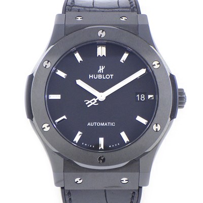 ウブロ Hublot 腕時計 クラシック フュージョン ブラックマジック 45mm 511.CM.1171.RX デイト 裏スケ ビス ブラック文字盤 黒 サテン仕上げ セラミック チタン SS アリゲーターレザー&ラバーベルト 自動巻き 【中古】