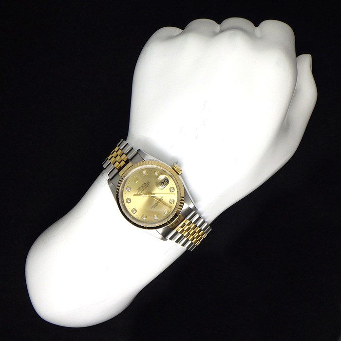 ロレックス Rolex 腕時計 デイトジャスト 16233G W番 1994-1995年製 10ポイント ダイヤインデックス サンレイ シャンパンカラー文字盤 フルーテッドベゼル ジュビリーブレス K18YG SS 自動巻き 【中古】