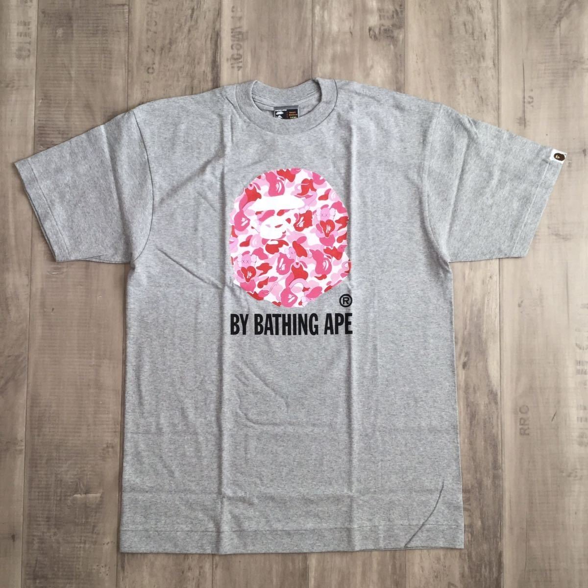 a bathing ape kaws ポロシャツ L s-l1200.jpg