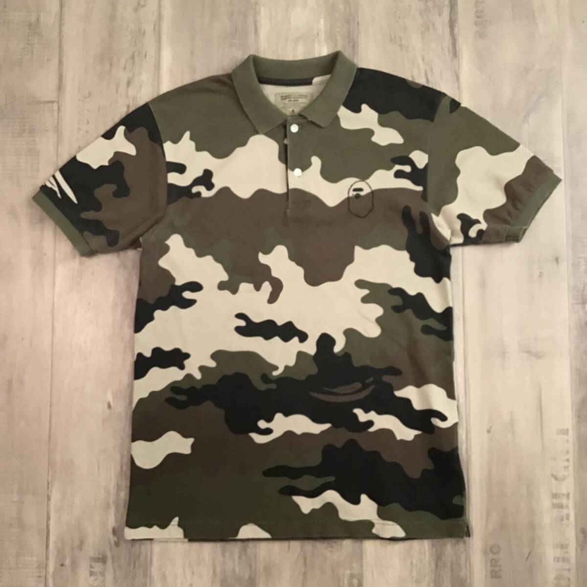 A BATHING APE 迷彩ポロシャツ A BATHING APE（アベイシングエイプ）の「1ST CAMO ONE POINT