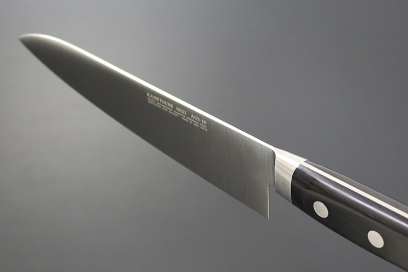 兼常作 モリブデン鋼AUS-10 口金付黒合板柄 牛刀180mm 本刃付