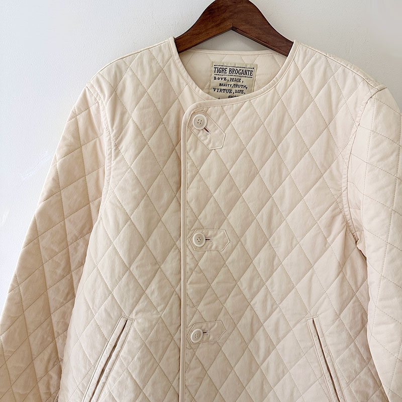 ティグルブロカンテ ナイロンツイルキルティング ライナーハーフコート unisex