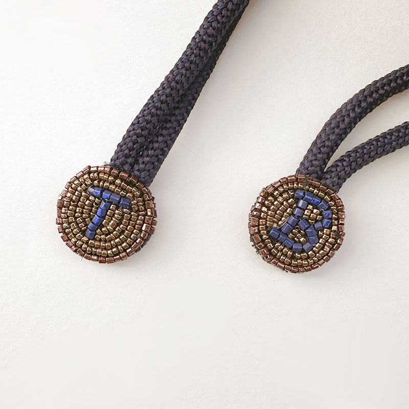 ティグルブロカンテ Tigre刺繍巾着バッグ